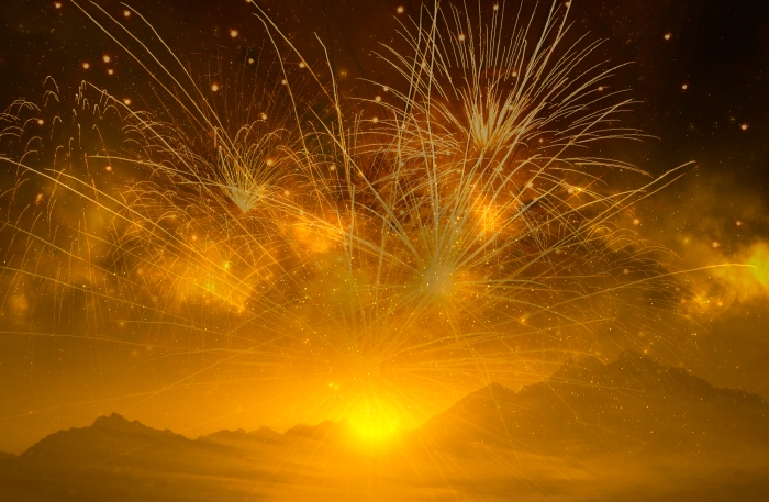 Fireworks Above The Mountains At Sunset
